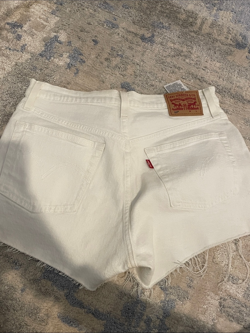 Levi's Cream White Denim Frayed Hem Shorts